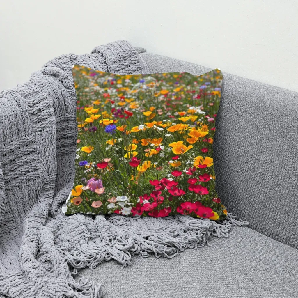MockupPress render: flower field design on a throw pillow on a sofa