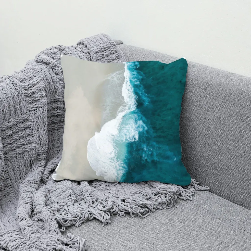 MockupPress render: aerial ocean photo printed on a throw pillow