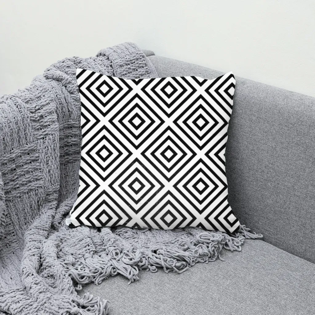 MockupPress render: black and white diamond line pattern on a pillow, lines bend with the fabric